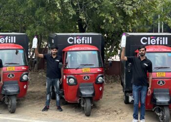 Have you seen those Red and Black three wheeler tempos running around the city?